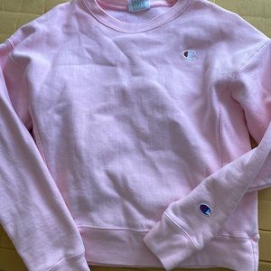 A barley worn Champion crewneck sweatshirt